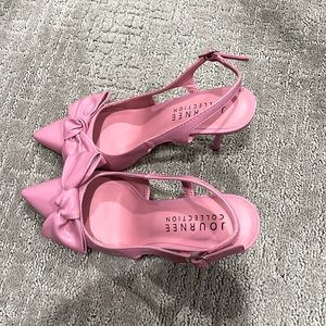 BRAND NEW - Very cute Patent Leather Pink Heels with Bow. Never worn.